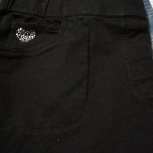 Capri pants, zipper & sparkles on the hem